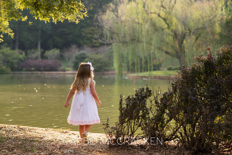 Exploring Freedom Park with a three year old girl in adorable white dress