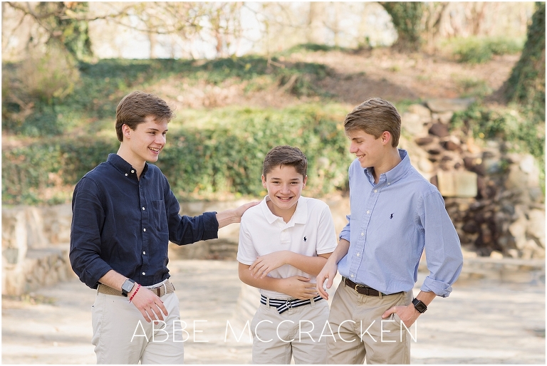Candid portrait of three brothers in Charlotte's Independence Park