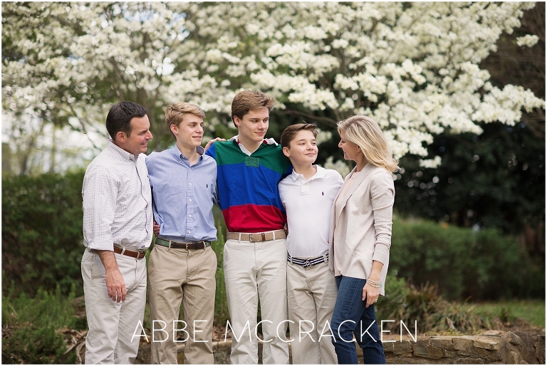 Candid family pictures taken during a senior portrait session in Charlotte NC