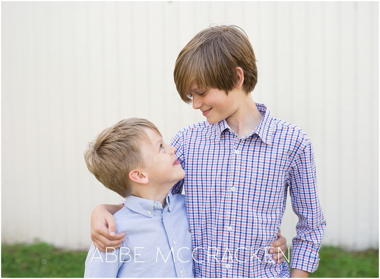 Candid portrait of brothers photographed during a family session in Charlotte's Freedom Park