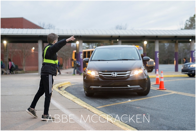 Young boy on Safety Patrol duty at school