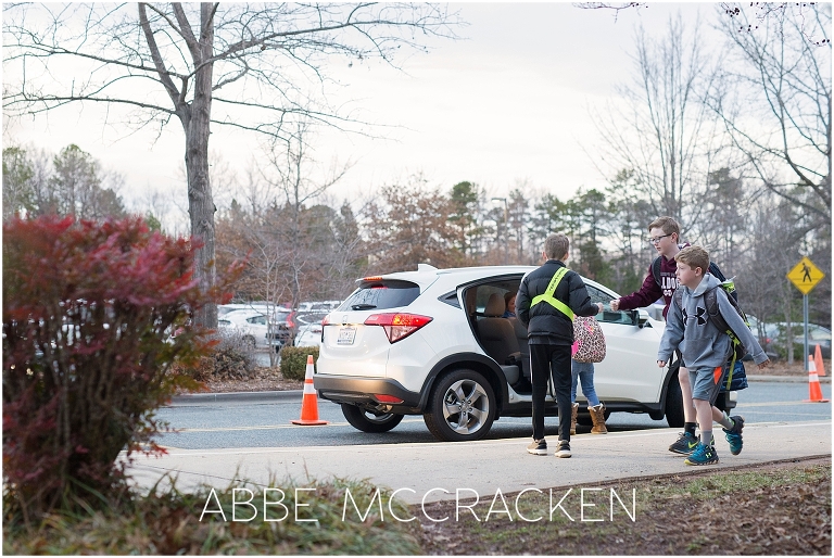 Young boy on Safety Patrol duty at school