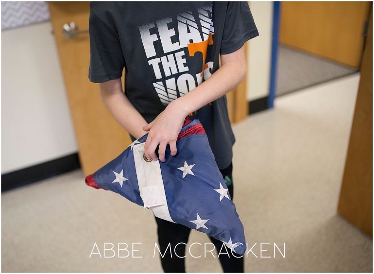 School children taking down flags