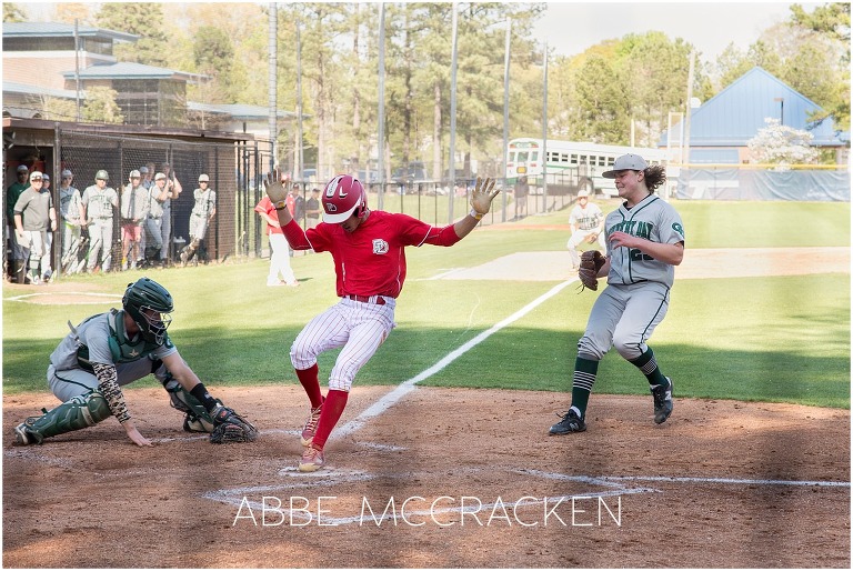 Bryce Daniel, Providence Day Senior stealing home plate during a baseball game against Charlotte Country Day