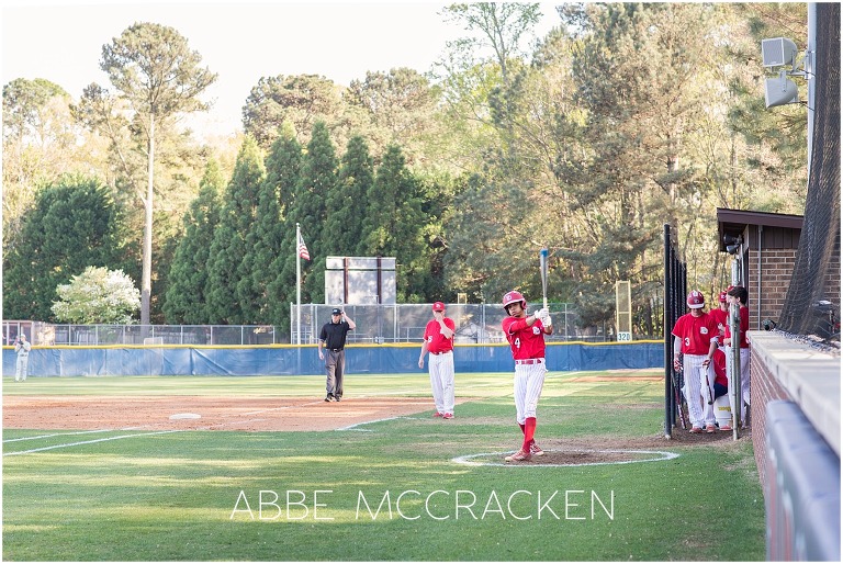 Bryce Daniel preparing to bat for Providence Day School, high school senior action shots