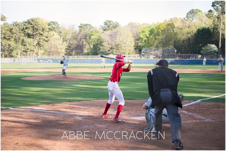 Bryce Daniel at bat for Providence Day School, high school senior action shots