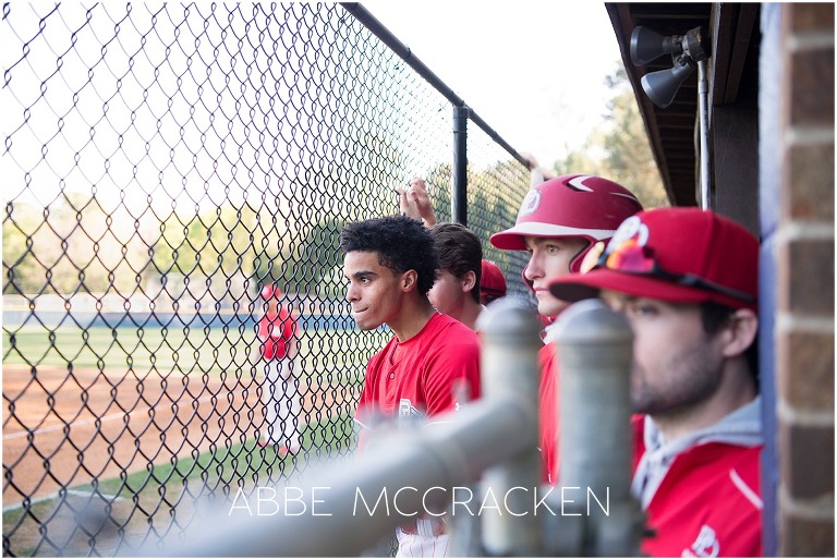 Dugout shot of Bryce Daniel and high school baseball teammates