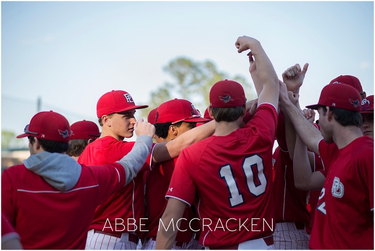 Providence Day School baseball team celebrating a win over Charlotte Country Day