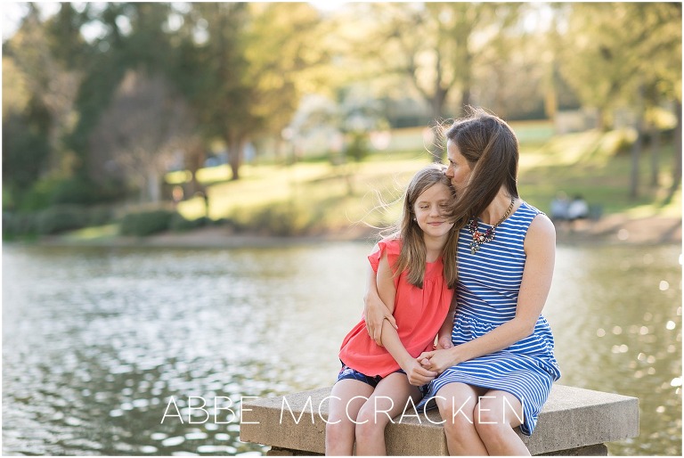 Mother and daughter snuggling at Freedom Park in Charlotte, NC