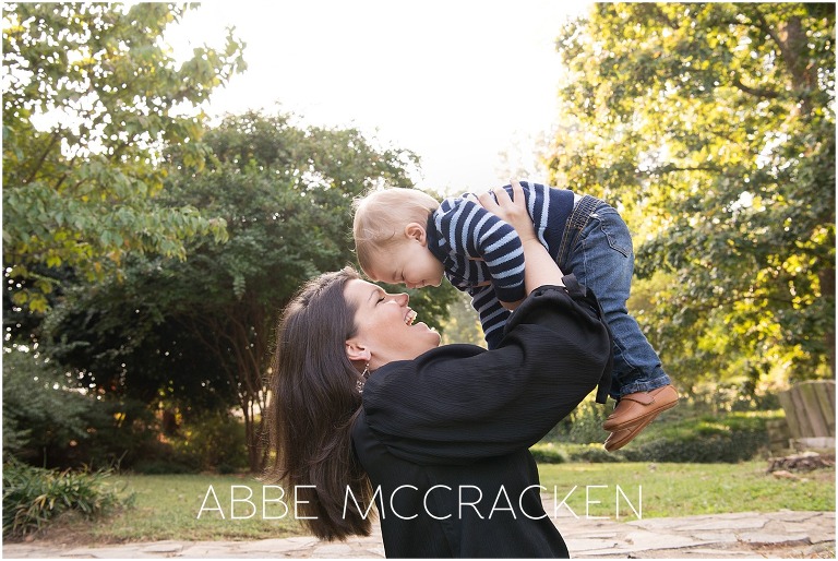 Joy-filled image of a mother playing with her baby boy