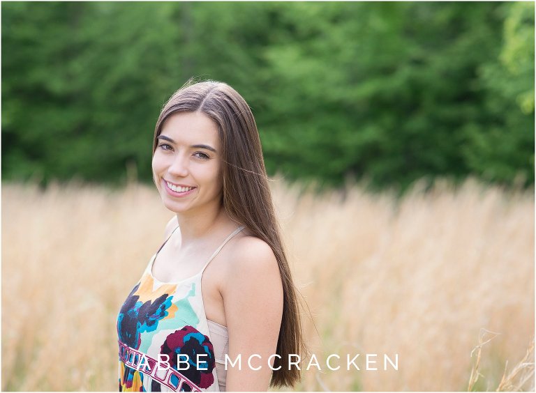 Natural senior portraits in wheat field