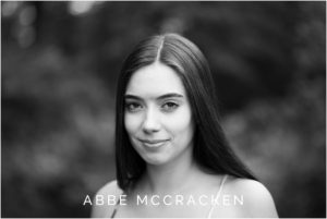 moody senior portrait, natural light