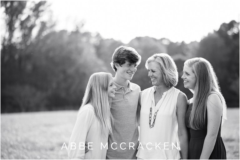Portrait of mother and three teenage children