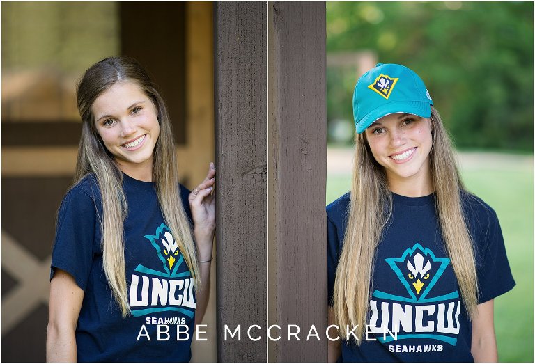 Senior portraits in college shirt and hat, University of North Carolina Wilmington