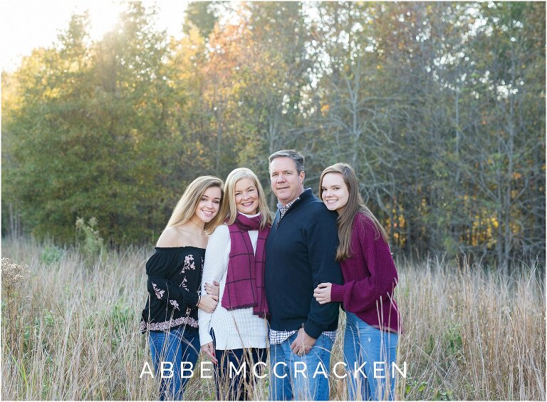 Family of four, picture taken during daughter's senior portrait session