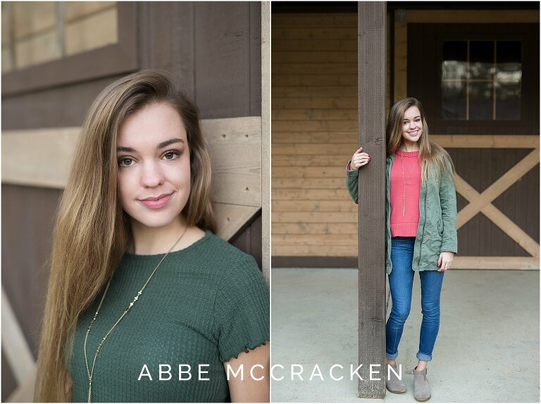 High school senior portraits standing against a barn