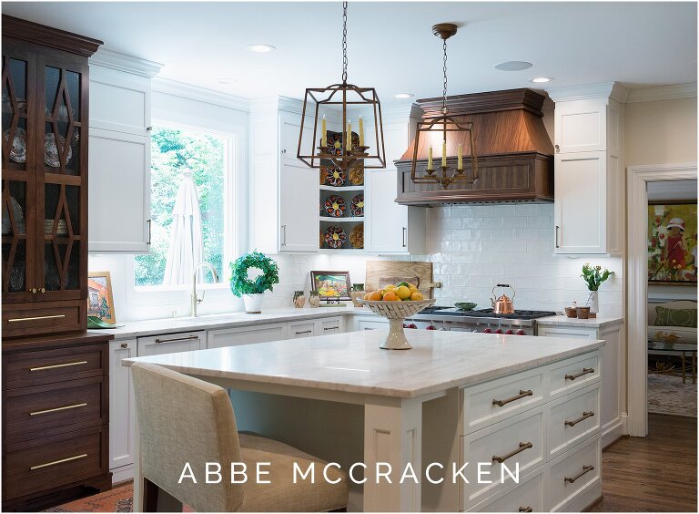 Kitchen renovation with gorgeous white marble and dark woods