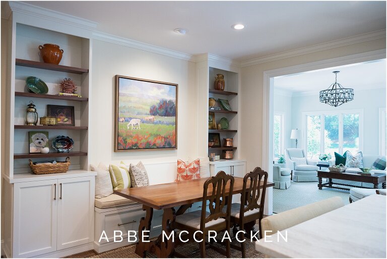 Image showing kitchen and breakfast nook connected to sunroom. Interior design and remodeling by The Warrick Company