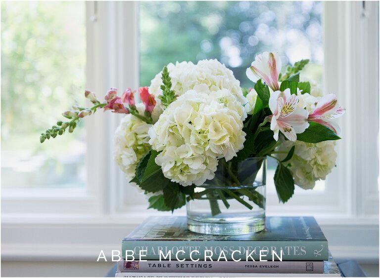 Gorgeous white hydrangeas make a statement in newly decorated sunroom