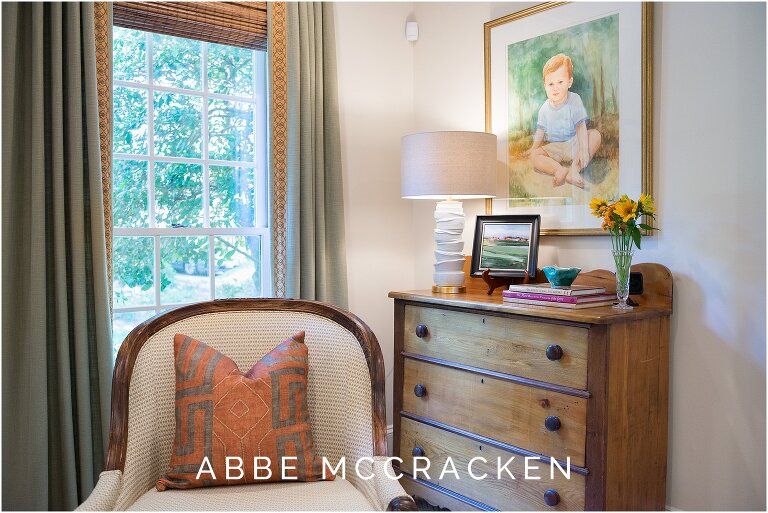 Cozy furniture and layers of design in this Quail Hollow neighborhood home. Interior design by The Warrick Company.