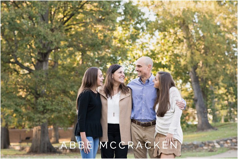 candid family picture with teenage daughters