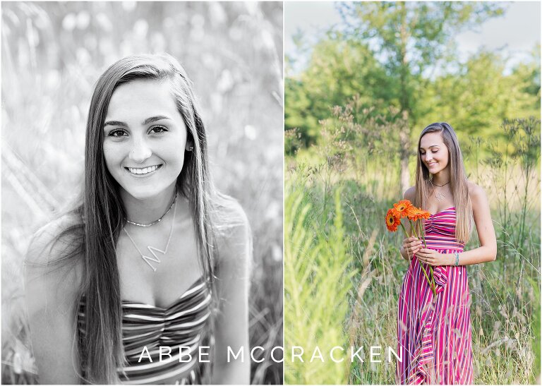 Senior portraits of gorgeous brunette in colorful stripped dress, holding flowers