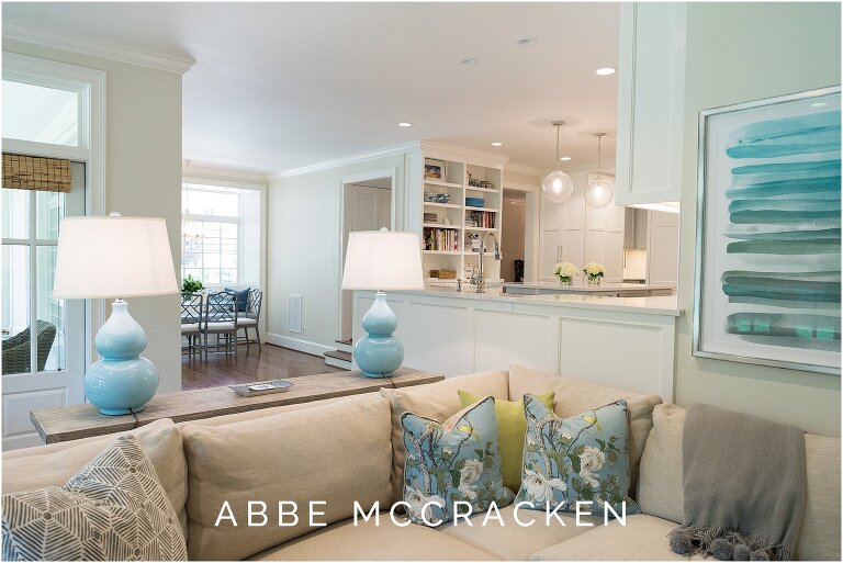 Another view of family room and kitchen, blue decor accents