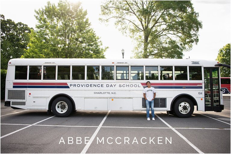Senior picture with the Providence Day School bus