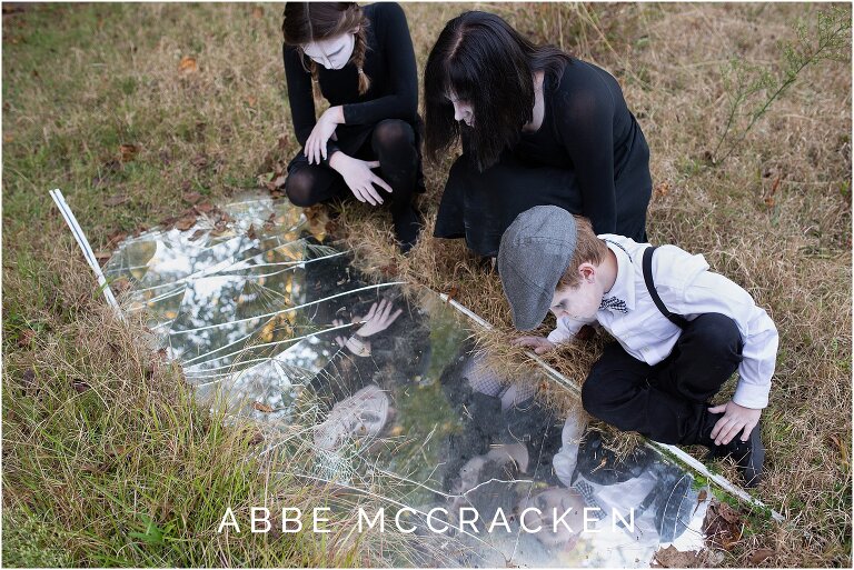 Ghost children looking into a mirror on abandoned property