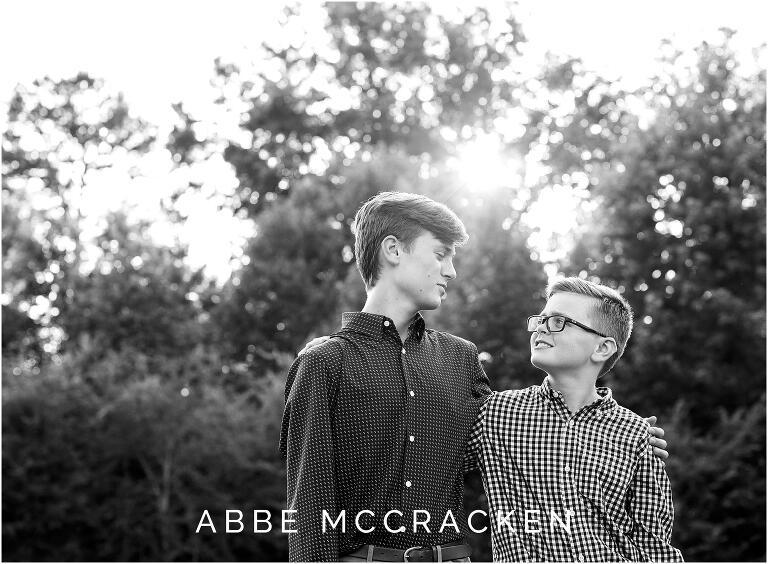 Black and white candid of brothers talking
