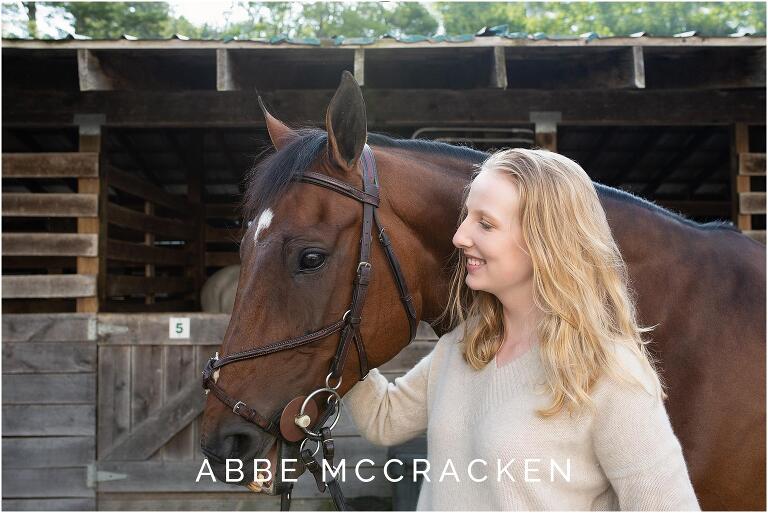 Senior girl and her white horse photographed at Blowing Rock Equestrian Preserve