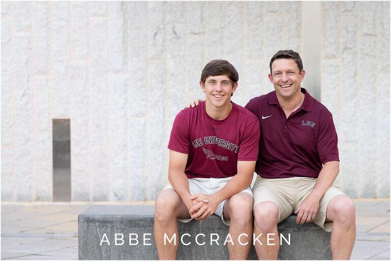 Senior portrait of a father and son wearing Lee University shirts
