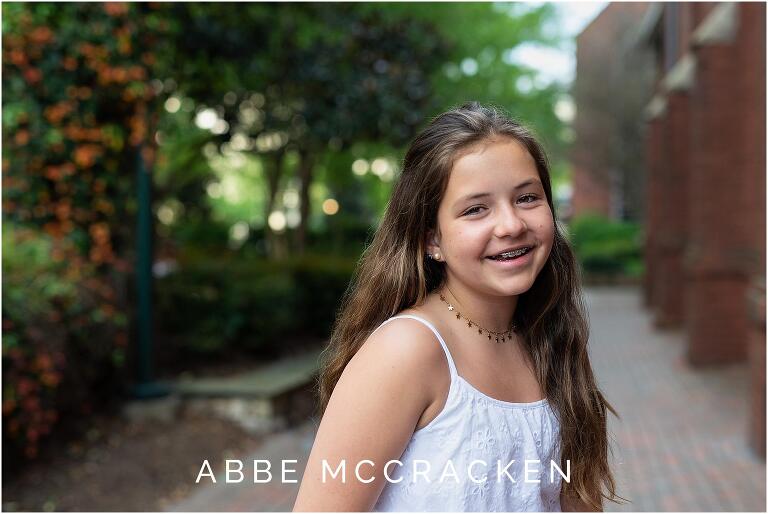 portrait of a girl smiling in Uptown Charlotte