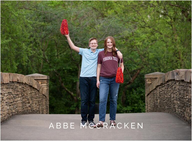 High school senior and her younger brother celebrating her acceptance to Virginia Tech