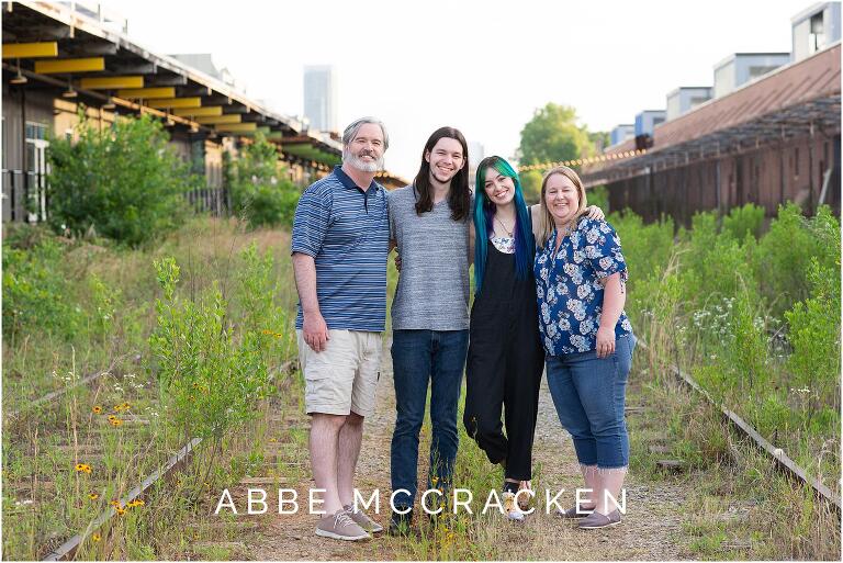 Family portrait on abandoned railroad tracks at Camp North End, Charlotte