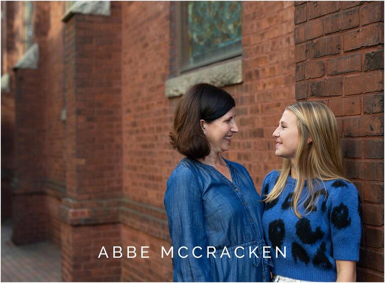 Candid photo of mother and high school senior daughter