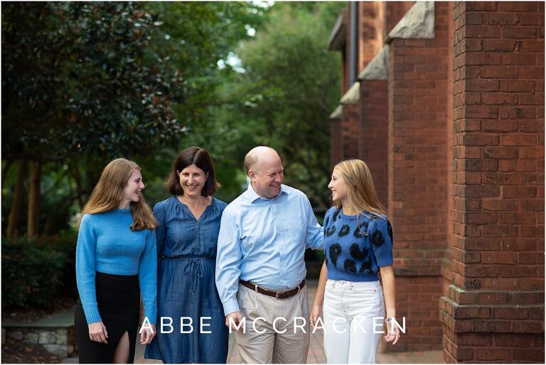 Candid family photo with high school senior daughter