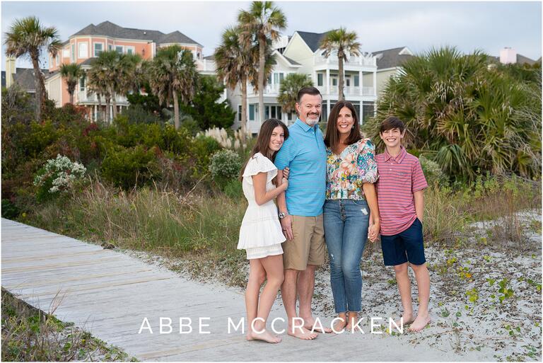 Family portrait on a boardwalk leading to the beach from Wild Dunes Resort, Isle of Palms, SC