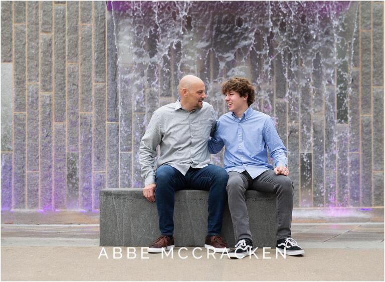 Candid senior portrait of father and son