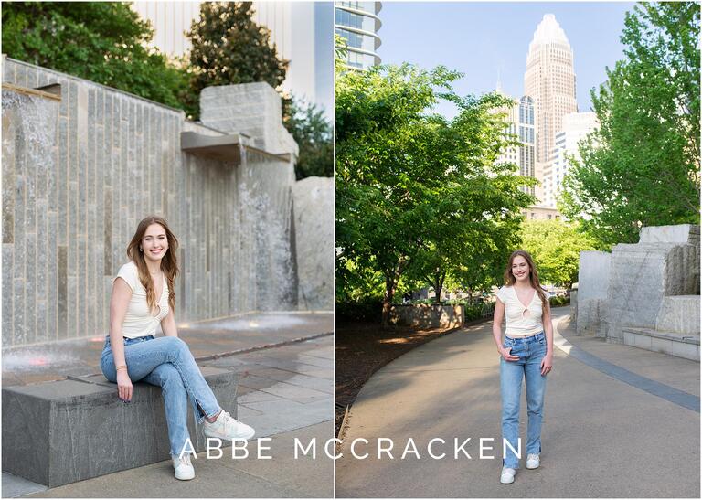 Senior pictures in Romare Bearden Park including Charlotte skyline