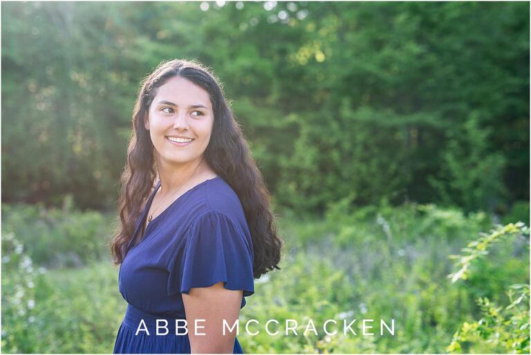 Gorgeous candid senior portrait with sun flare