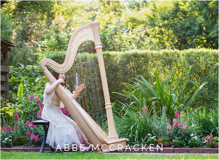 Senior pictures with harp in Winghaven Gardens