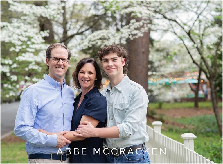 spring family picture in downtown Matthews NC with blooming dogwoods