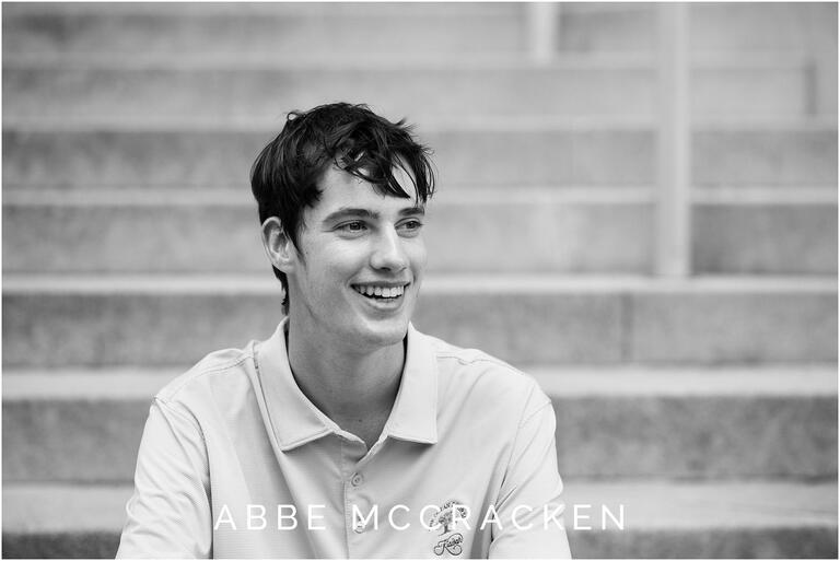 candid senior picture of guy laughing