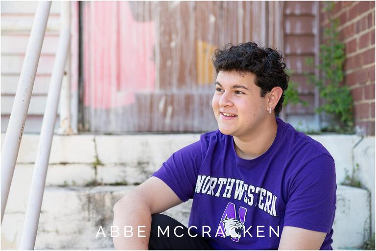 Senior guy wearing his Northwestern University acceptance t-shirt
