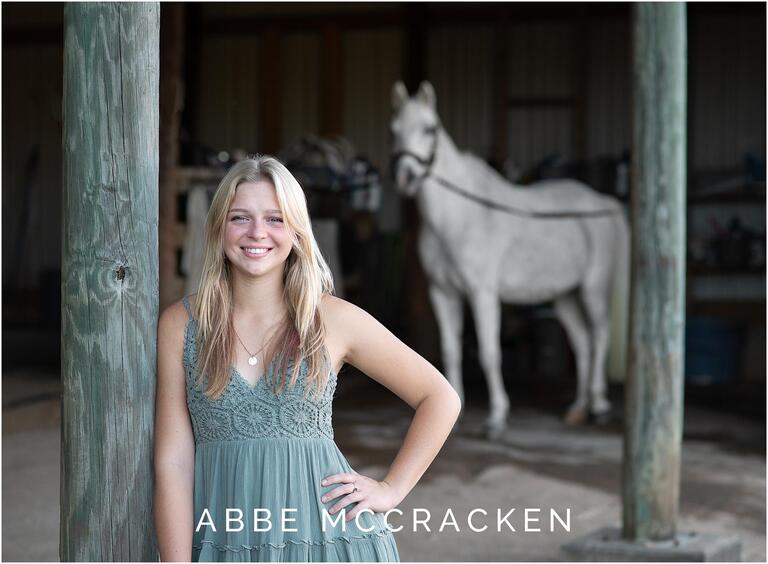 Senior pictures of a girl and her horse