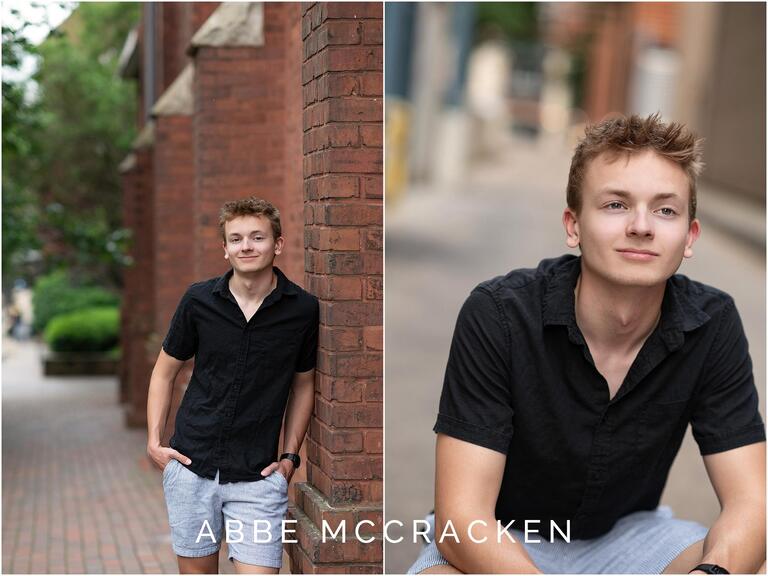 Senior pictures in black shirt and seersucker shorts